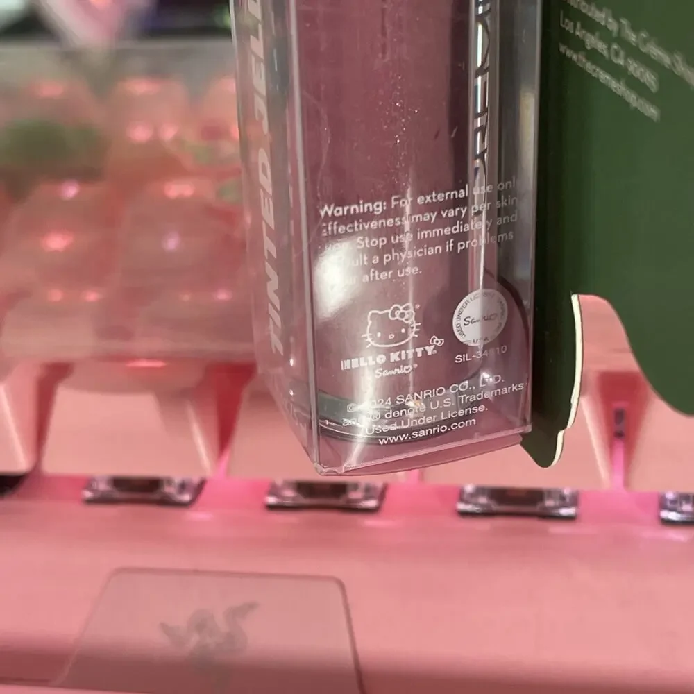 The Creme Shop Hello Kitty Christmas Lip Oil Tinted Jelly Crystal Rose Sanrio